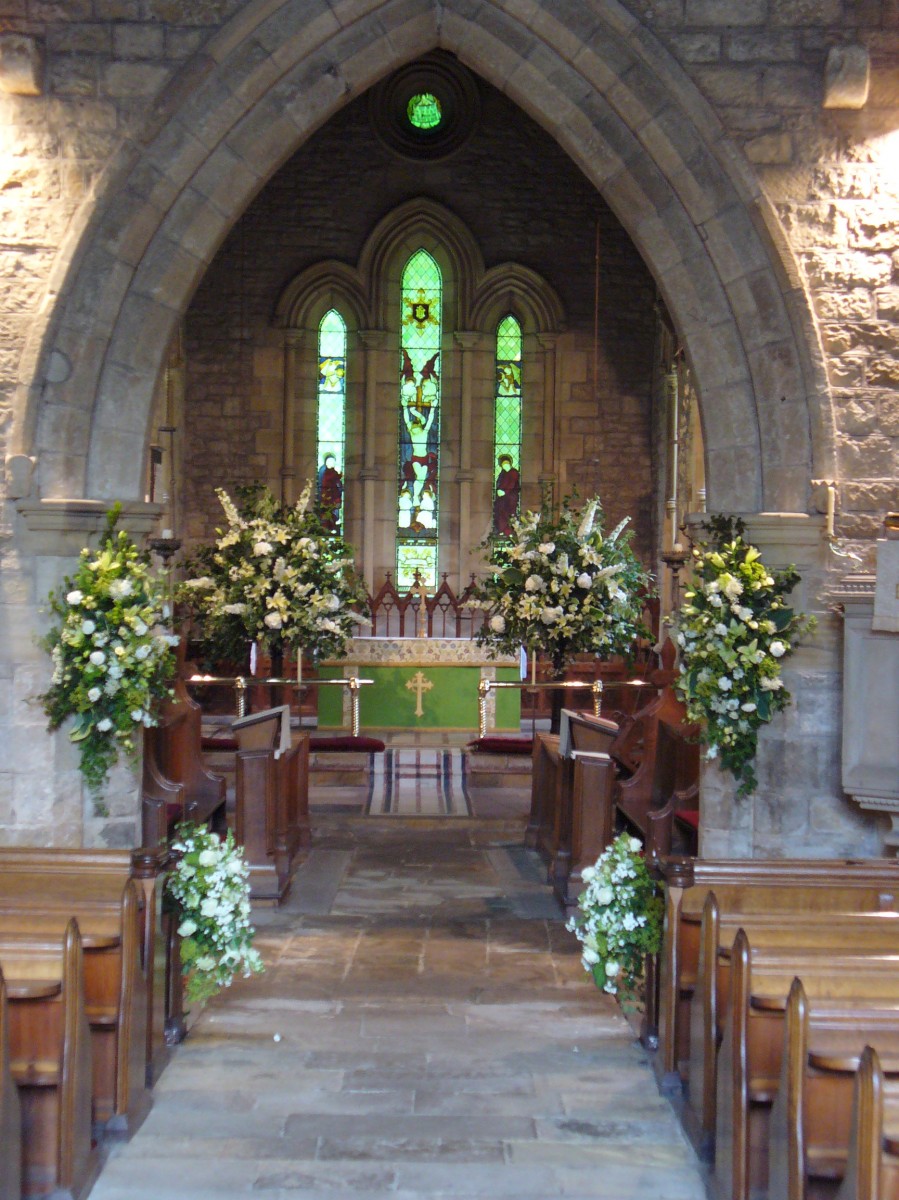 St Mungo's Church, Simonburn: interior with wedding flowers